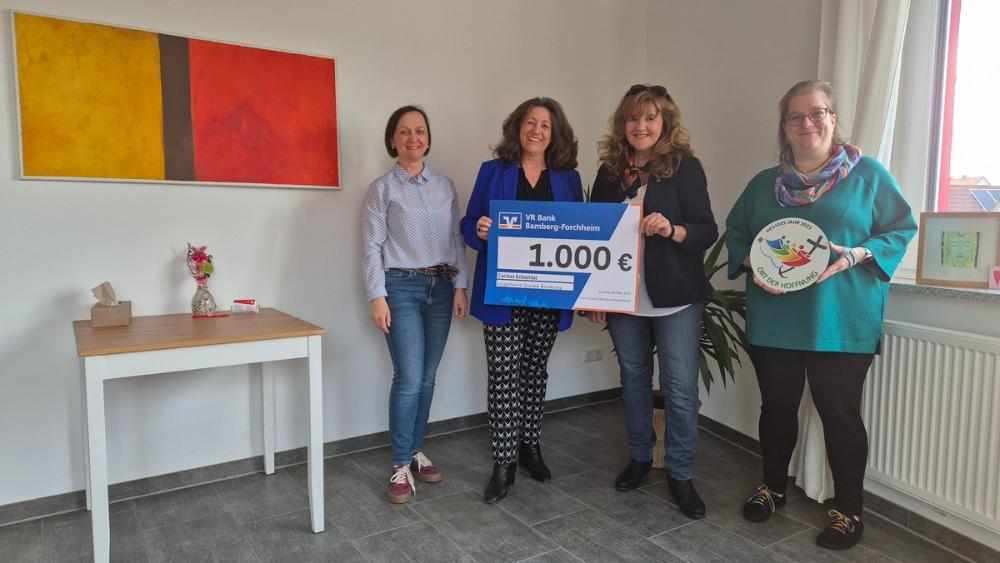 Übergabe Spendenscheck Caritas